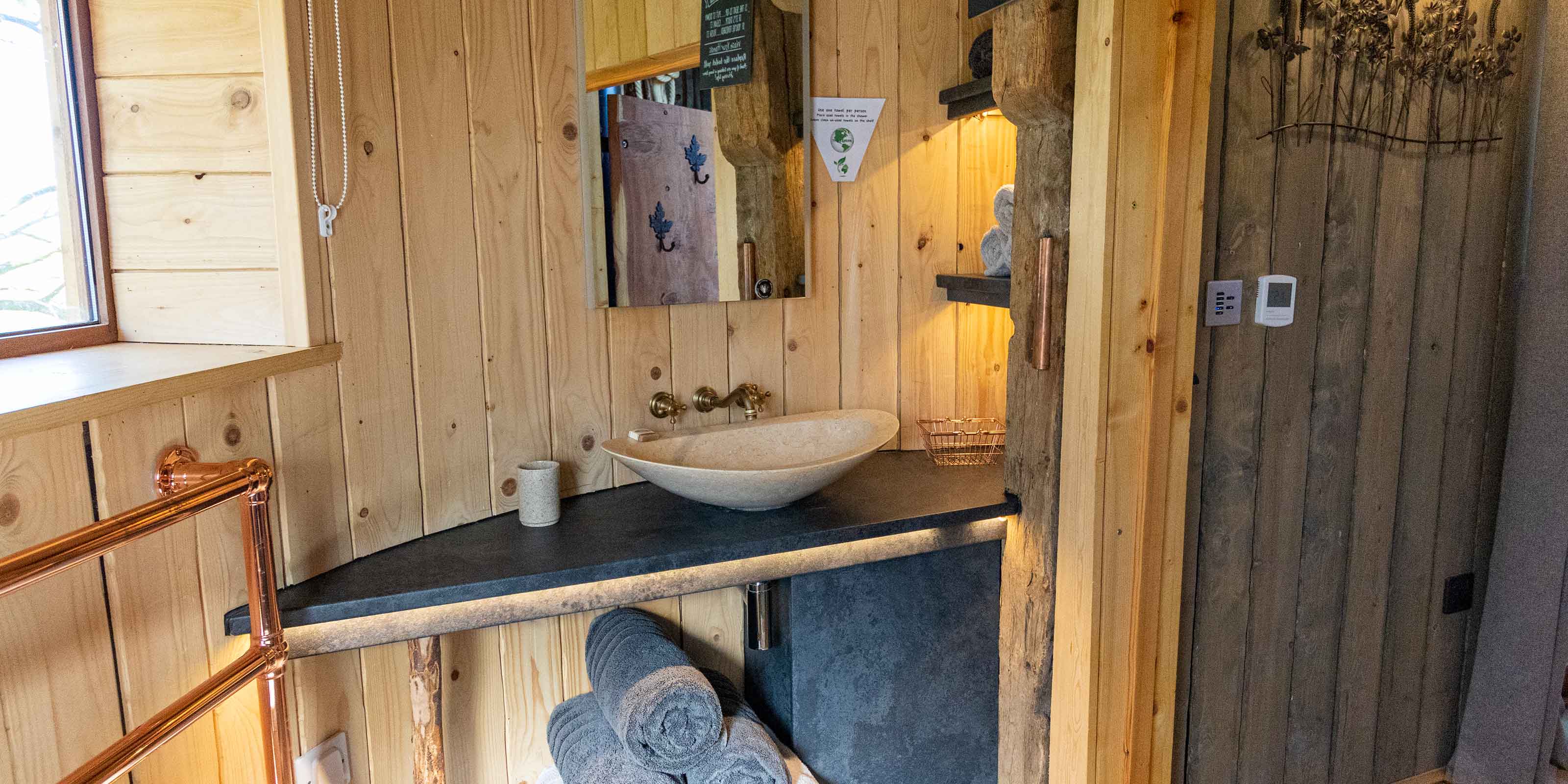 Bathroom of our family holiday Yorkshire treehouse breaks. Perfectly situated for treehouse breaks & York glamping hot tub. 